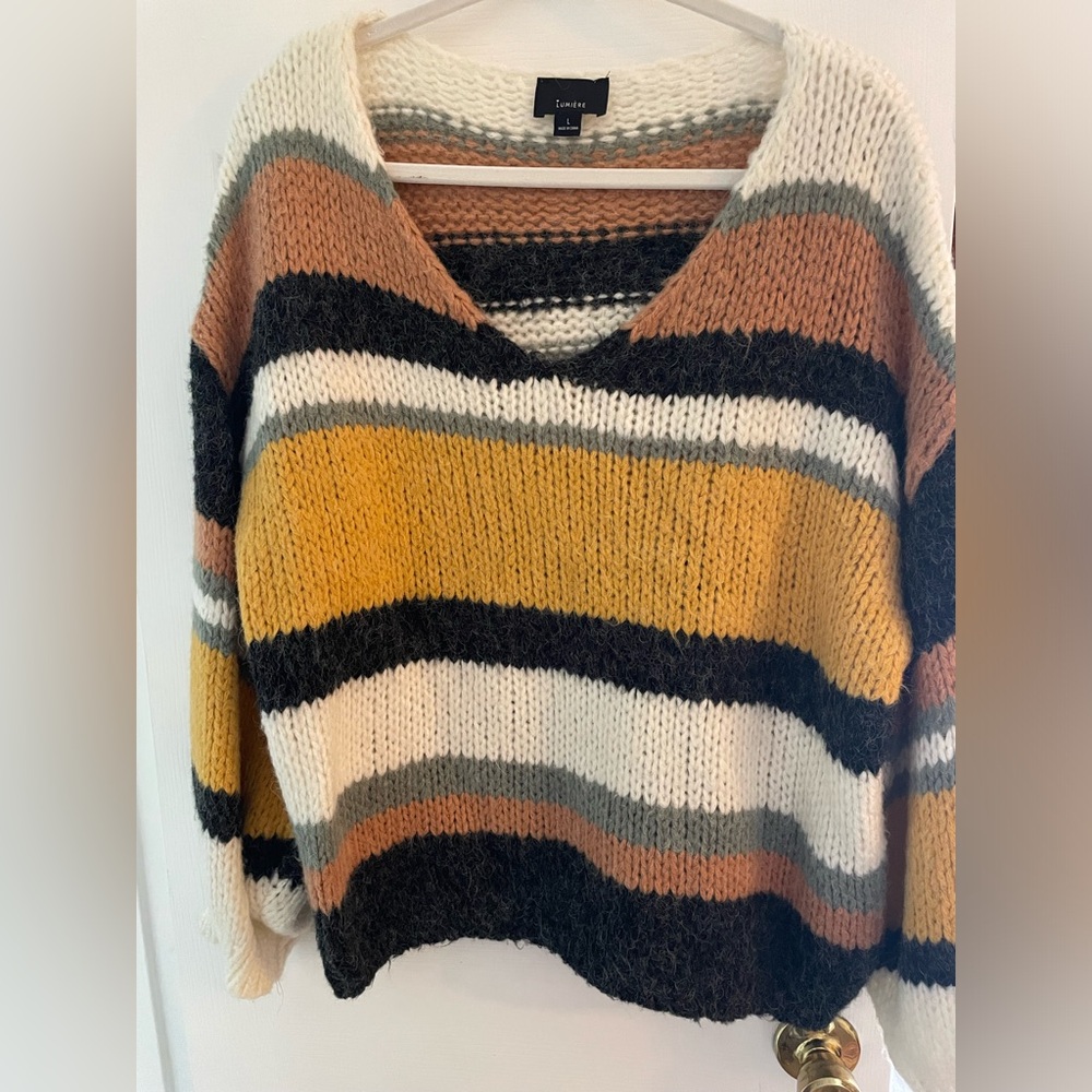 Striped knitted sweater.